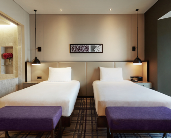 Executive Zweibettzimmer mit Meerblick – Bett